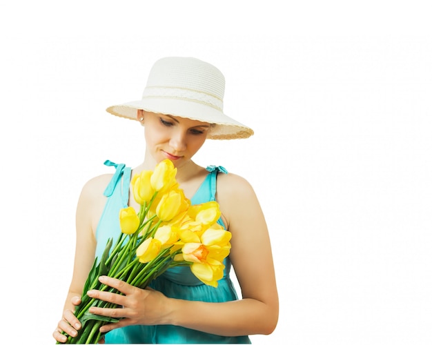 Woman in hat with flowers with his head down