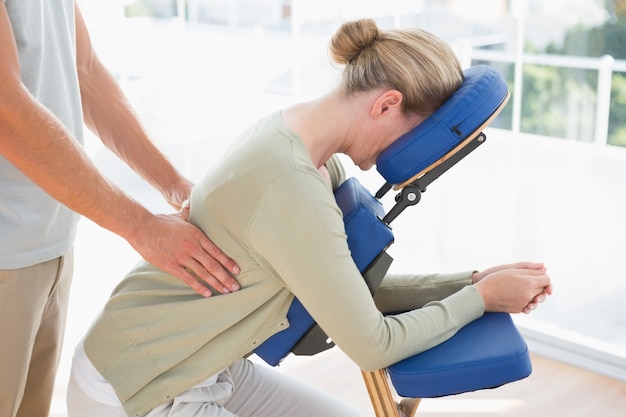 Woman having back massage 