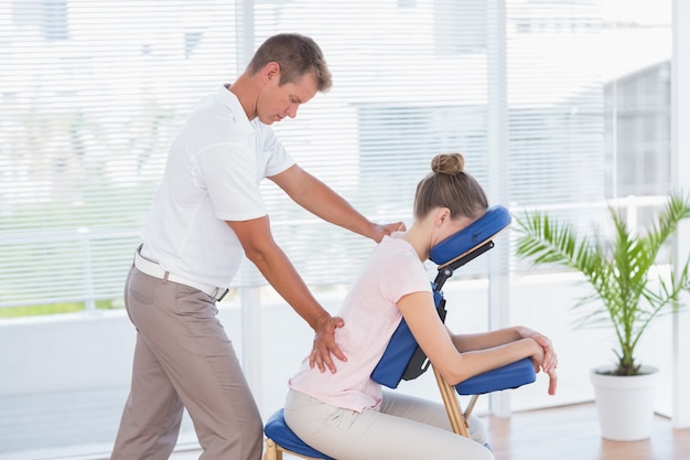 Woman having back massage 