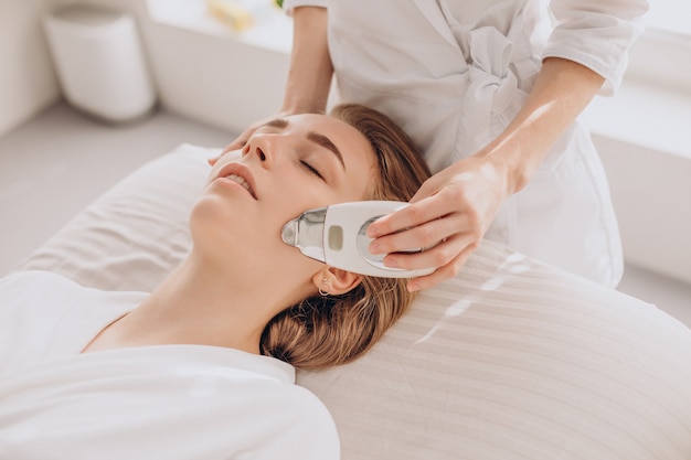 Woman having beauty treatment procedures in a salon