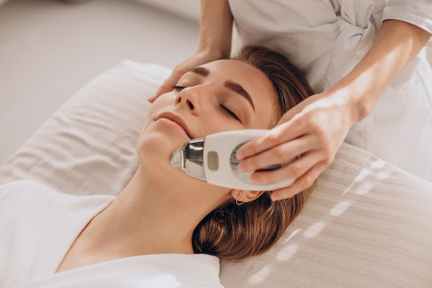 Woman having beauty treatment procedures in a salon