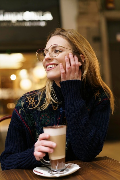 Woman having coffee