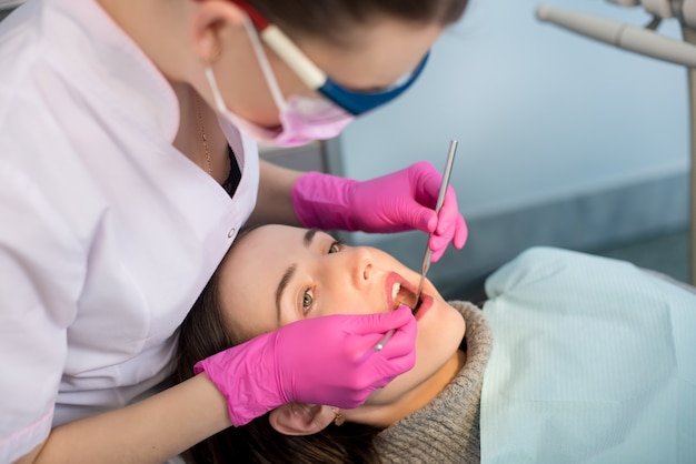 Woman having dental check up