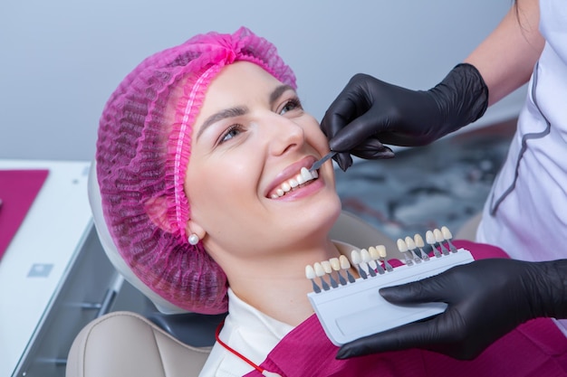 Woman having dental examination in stomatology clinic Treatment of caries modern medicine