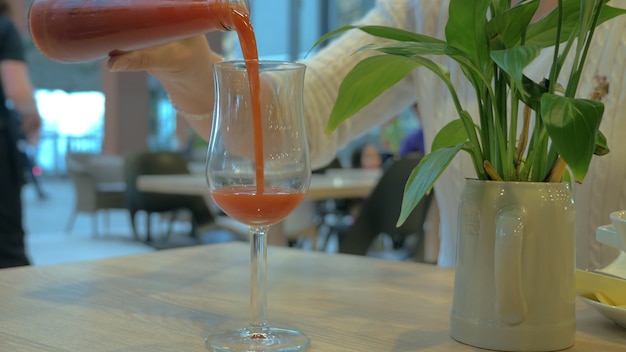 Woman having a drink in cafe