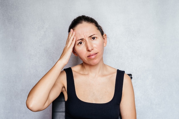 A woman having headache, exercises to beat headache