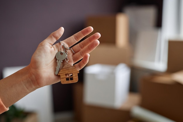 Woman having keys from new house