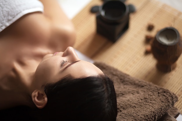 Woman having a massage in a spa