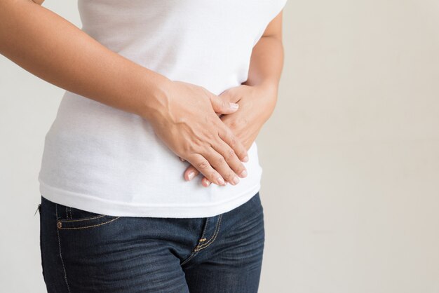 Woman having painful stomachache