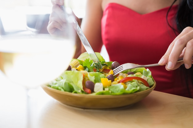 Woman having salad