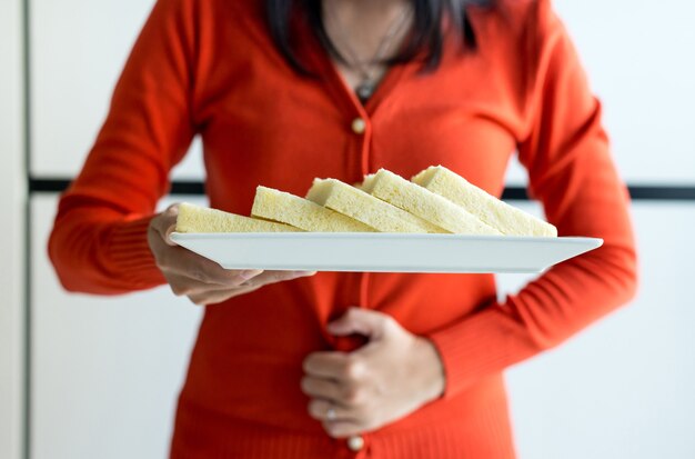 Woman having stomach ache and refusing white bread