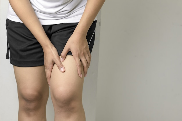 Woman having thigh pain