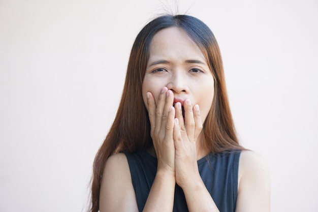 Woman having toothache from orthodontic treatment