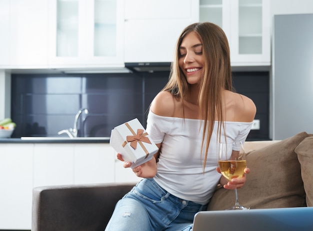 Woman having video call for birthday celebration on distance