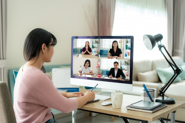 Woman having a video call meeting