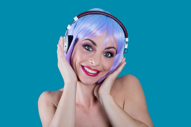 Woman in headphones enjoying music