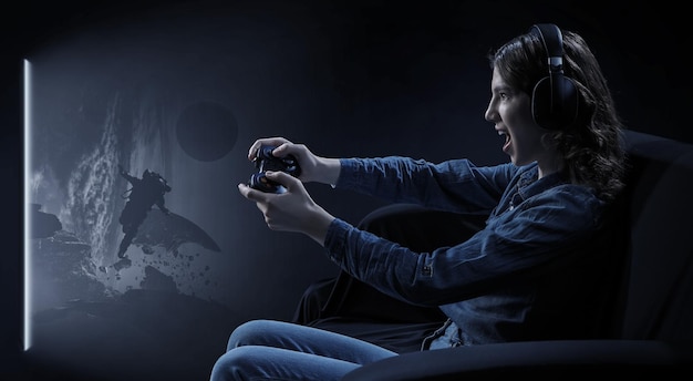 Photo a woman in headphones with a controller set aside in her hands plays games. mixed media