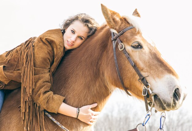 Donna e il suo ritratto a cavallo