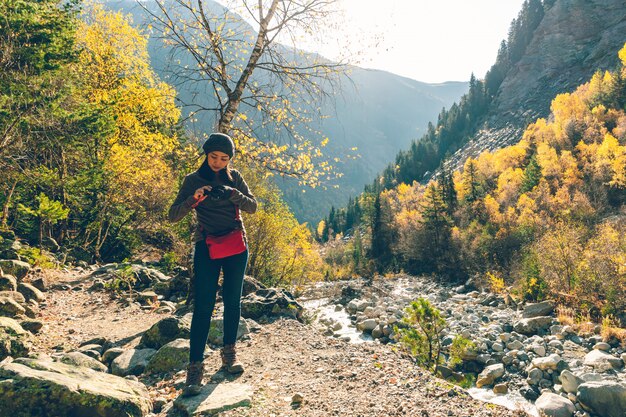 Woman hike through mountain and beautiful nature of forest.