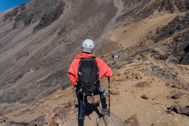 Woman Hiker In The Mountains.