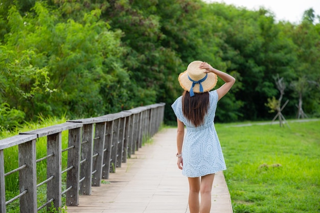 Woman hiking in the relax trail