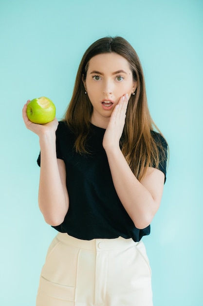 Woman hold green apple