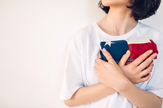 Woman holding an American flag