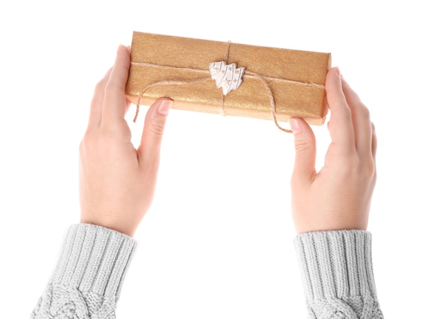 Woman holding beautiful gift box on white background