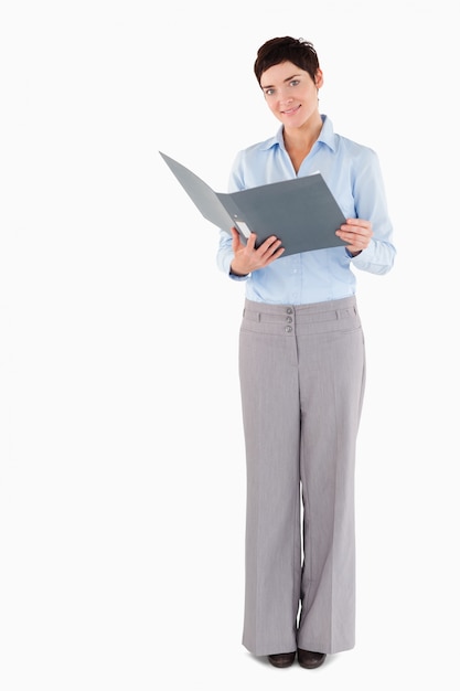 Woman holding a binder