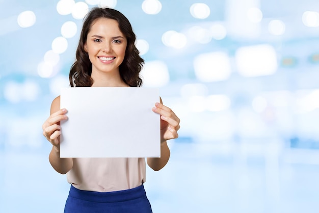 Woman holding blank card