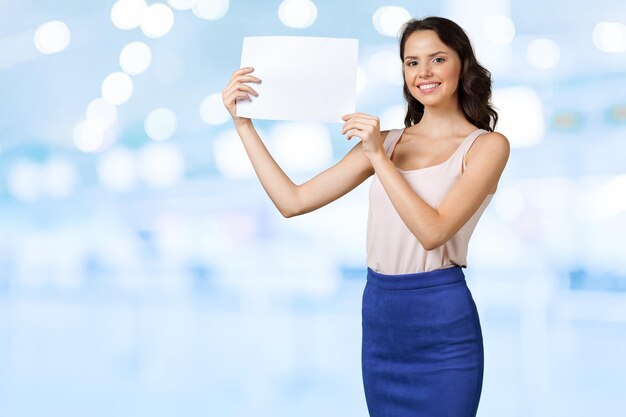 Woman holding blank card