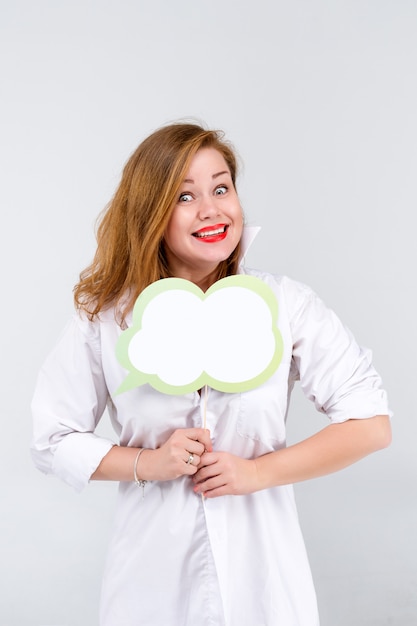 Woman holding blank cardboard bubble