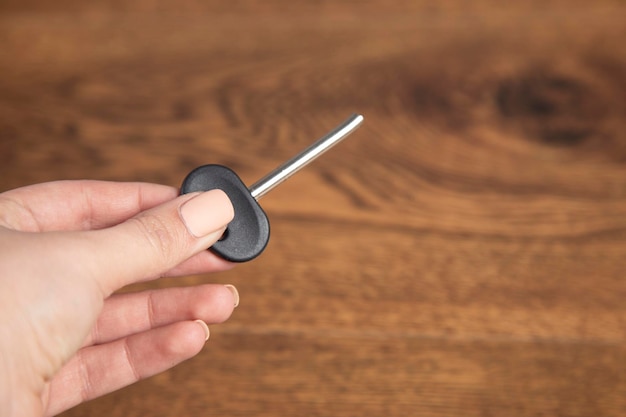 Woman holding broken key