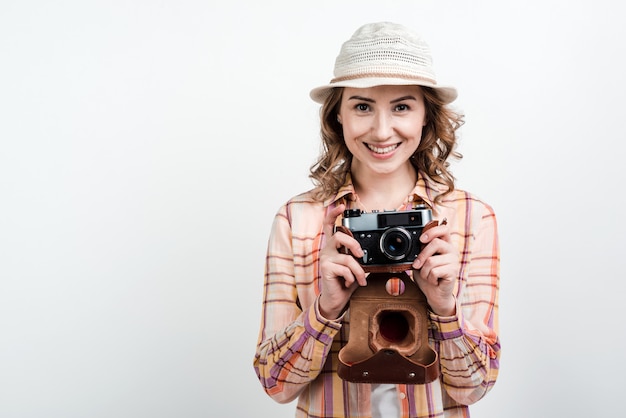 woman holding a camera in her hand.Isolated.