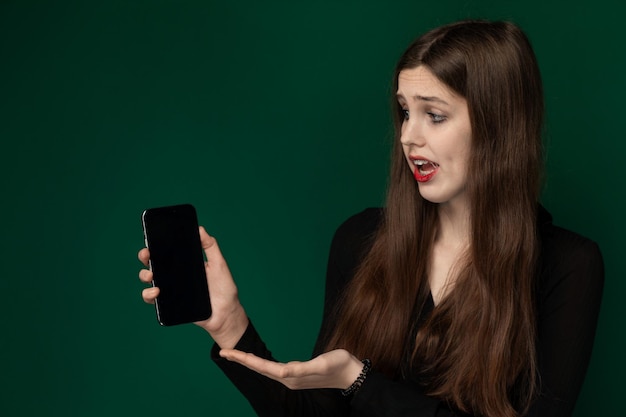 Woman holding cell phone