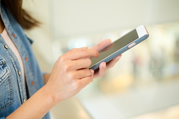 Woman holding a cellphone