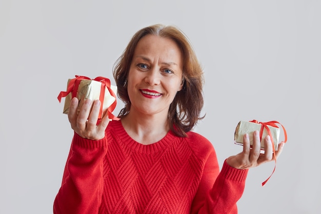 Woman holding christmas gifts