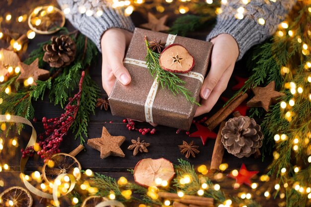 Woman holding Christmas present