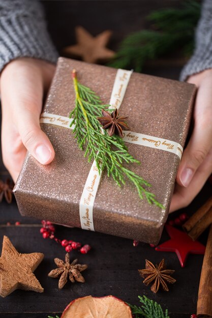 Woman holding Christmas presents