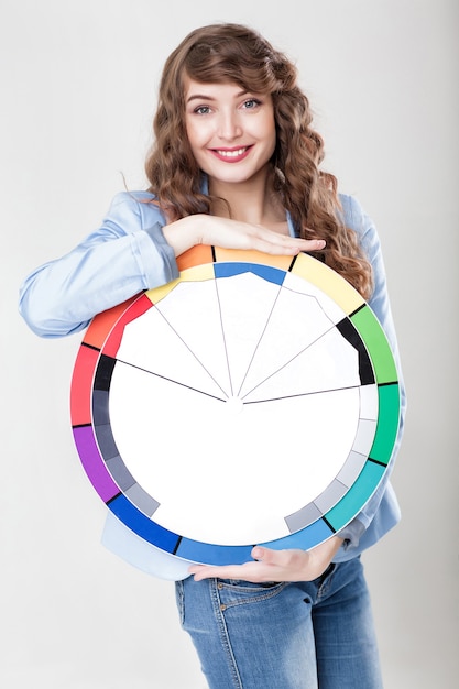 Woman holding color wheel