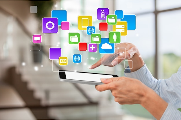 woman holding   digital tablet on background