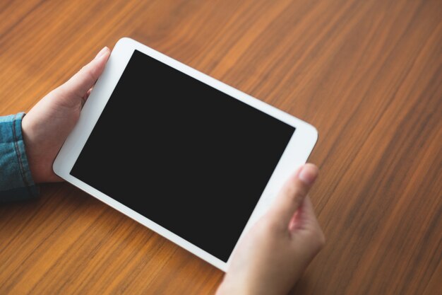 Woman holding a digital tablet