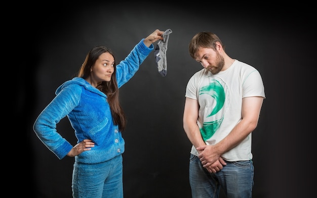 Woman holding a dirty sock