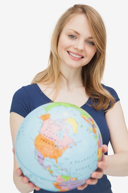 Woman holding a globe