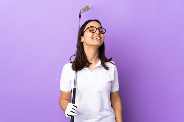 Woman holding a golf club