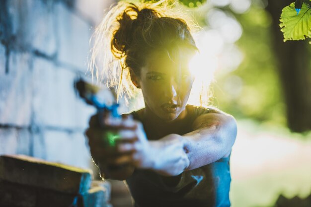 A Woman Holding a Gun