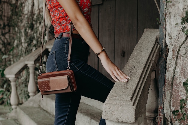 Woman holding a handbag, bag, purse