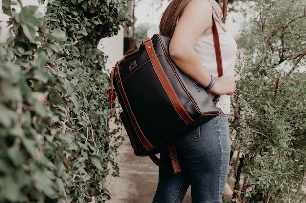Woman holding a handbag, bag, purse