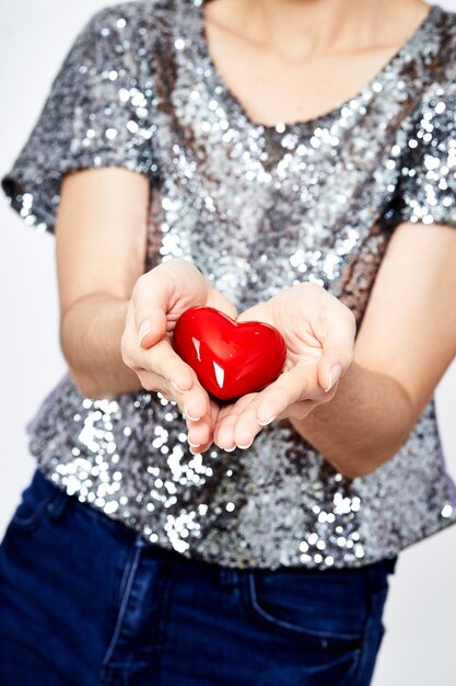 Woman holding heart