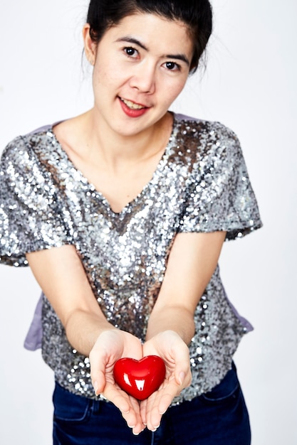 Woman holding heart